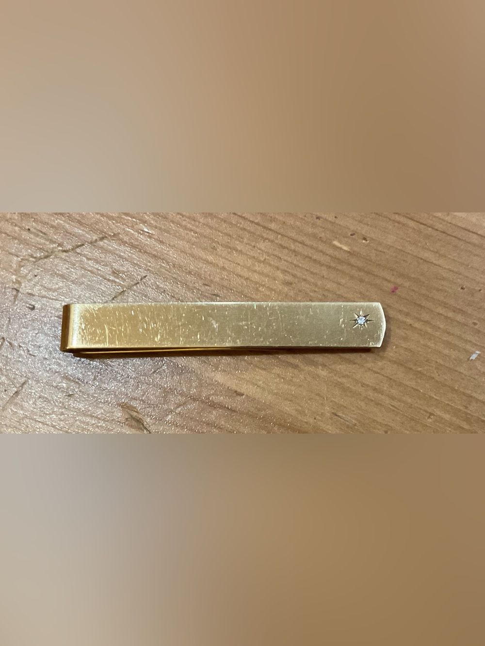 Vintage 10k yellow gold 6 grams men’s tie or money clip with diamond starburst.